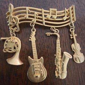Cute Vintage Bright GoldTone JJ Jonette Brooch Pin With Musical Instruments